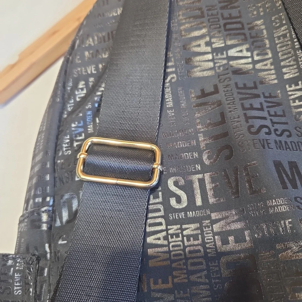 Steve Madden Black Logo Print Backpack Gold Tone Zippers Large Book Travel Bag